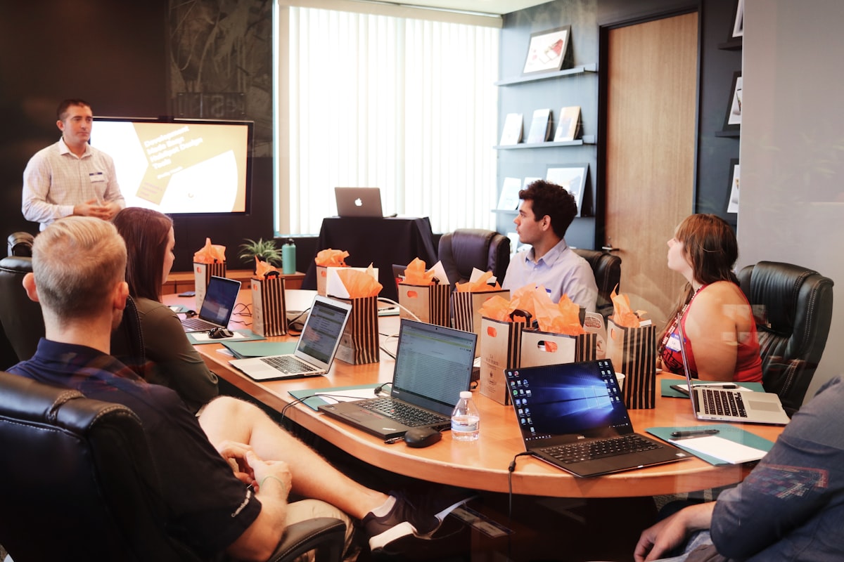 Developer presenting to team at a tech training session